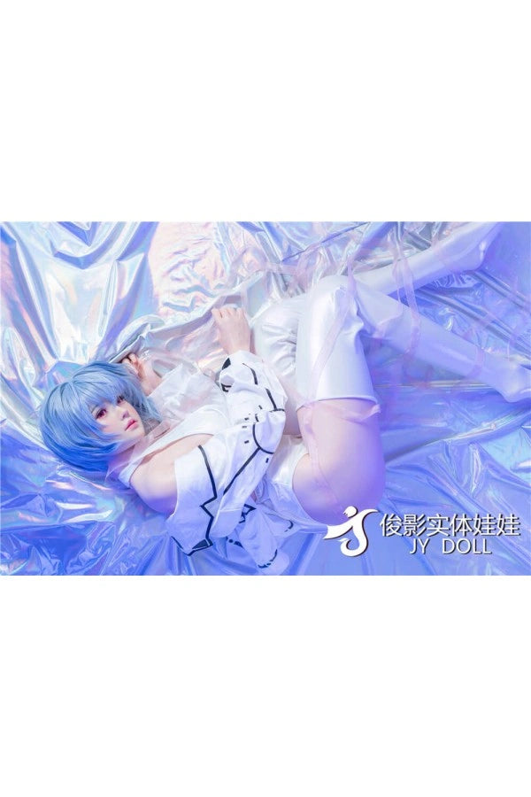Sexpuppe mit blauen Haaren liegend