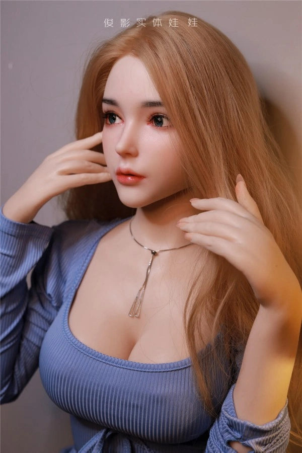 Sexpuppe mit blonden Haaren, Kleidung