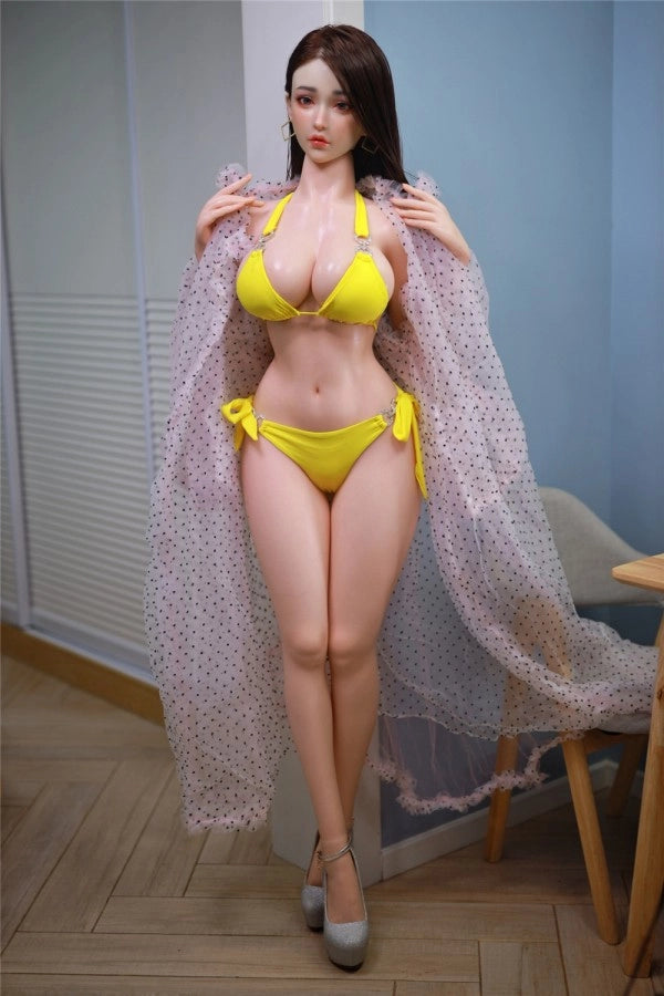 Sexpuppe in gelbem Bikini
