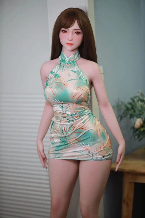 Sexpuppe in tropischem Kleid