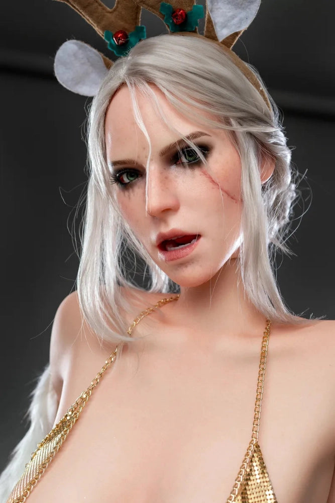 Sexpuppe mit blonden Haaren, Geweih