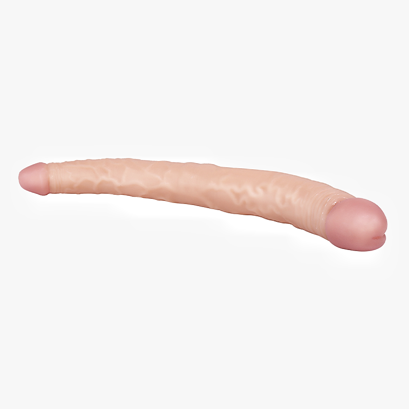 Langer, hautfarbener Dildo auf Weiß