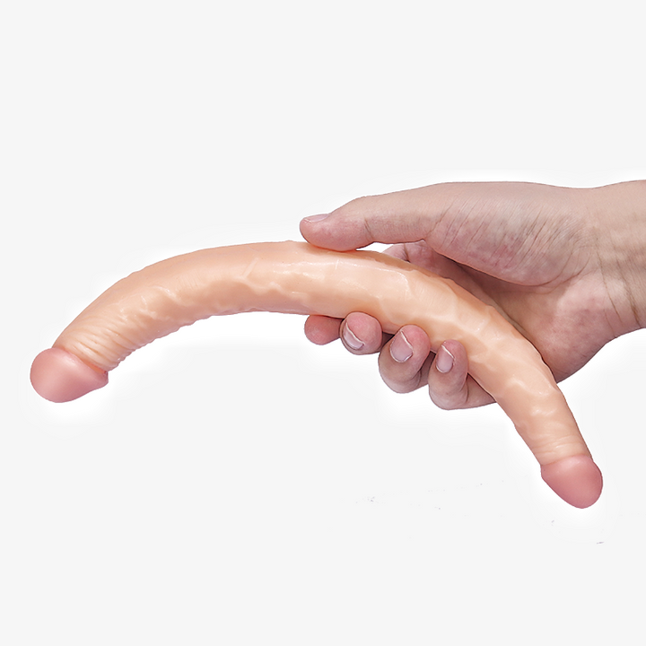 Hand hält flexiblen Dildo