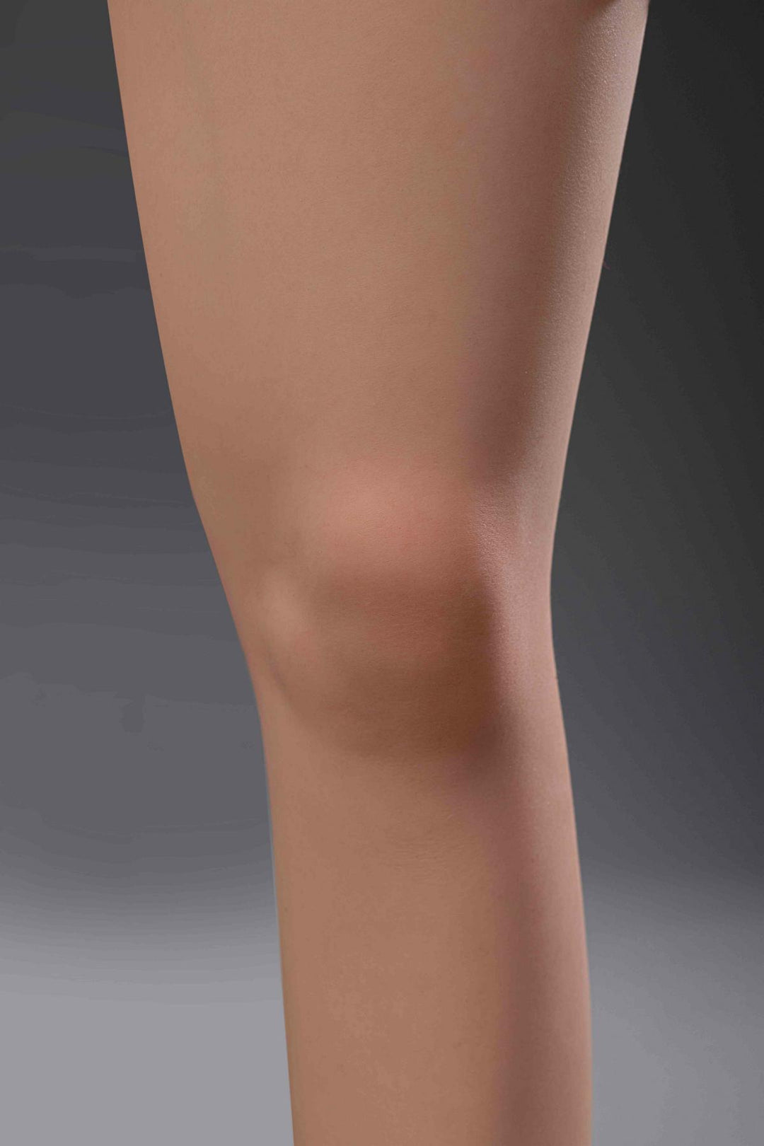 Sexpuppen-Knie in Nahaufnahme