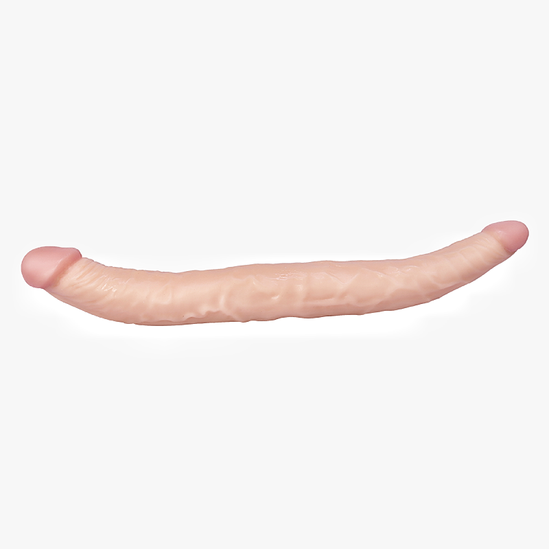 Langer, hautfarbener Dildo auf Weiß