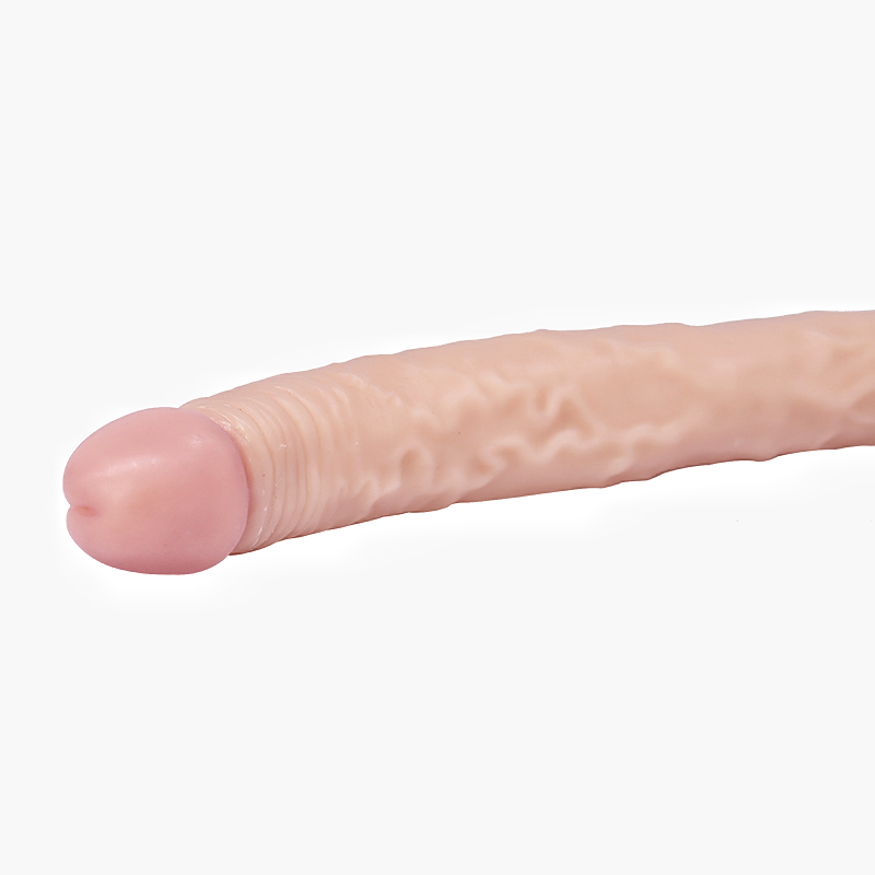Realistischer Dildo auf weißem Hintergrund