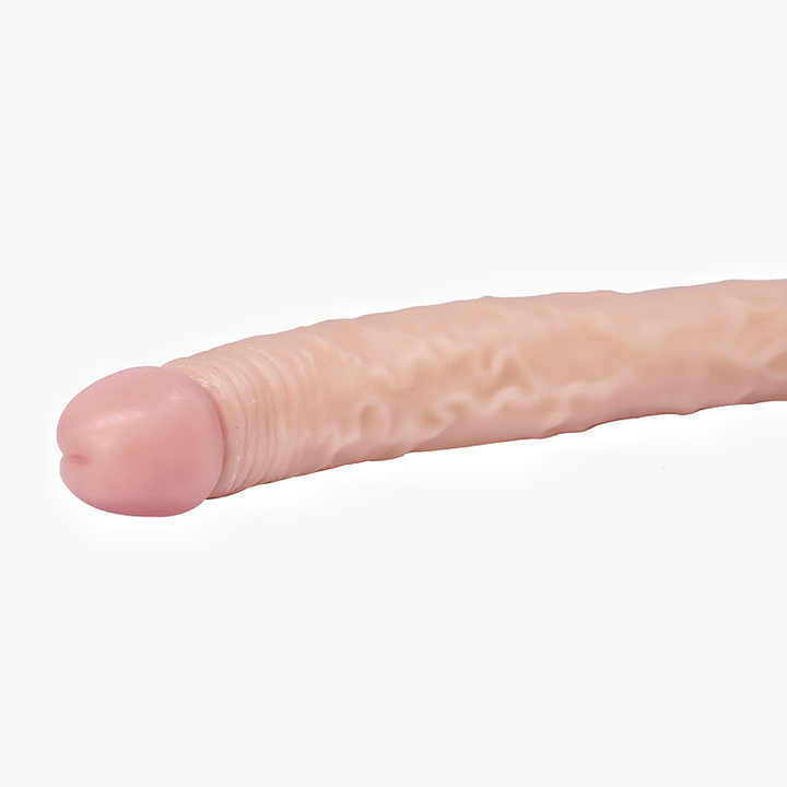 Realistischer Dildo auf weißem Hintergrund